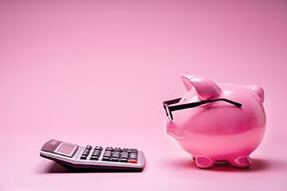 Piggy bank and calculator