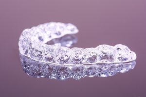 Clear aligner tray for invisible braces